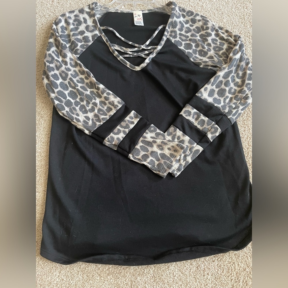 Shirt with animal print sleeves